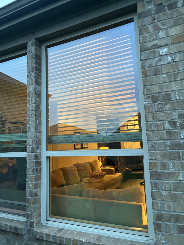 A freshly cleaned, streak-free window reflecting the sky
